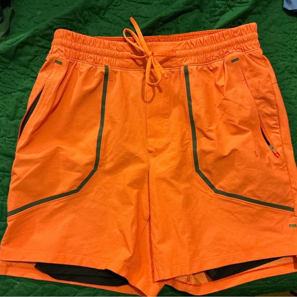 lululemon: [SeaWheeze?] Surge Lined Short 6”, size Med. in Orange Soda (M7AS0S)